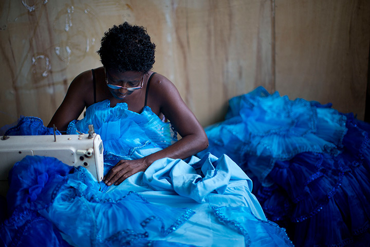 24 hours in pictures: A seamtress sews a costume for the Inocentes de Belford Roxo samba school