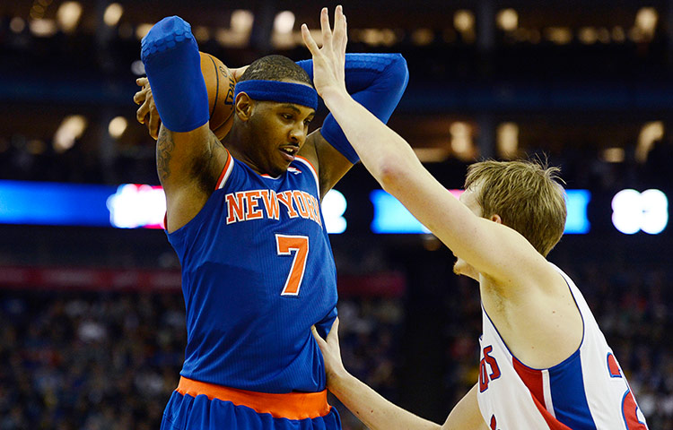 nba 3: Anthony protects the ball from Kyle Singler