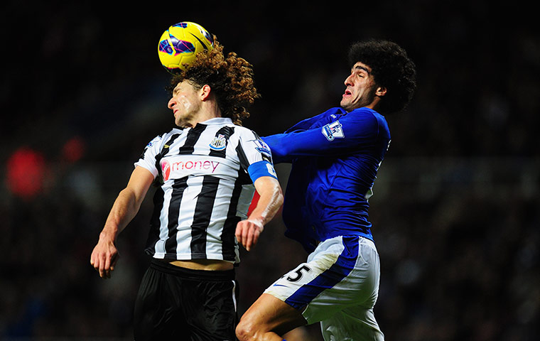wed footie: Fabricio Coloccini and Marouane Fellaini
