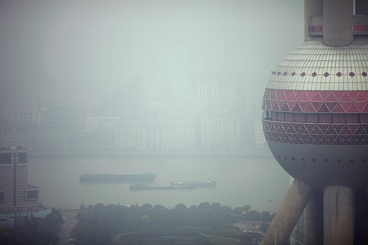 smog crisis in China: The Oriental Pearl Tower is seen on a hazy day in Shanghai