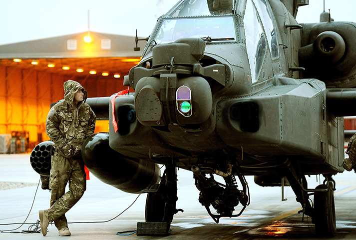 Prince Harry Afghanistan: Prince Harry makes his early morning pre-flight checks