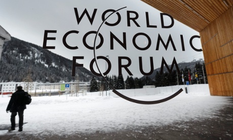 As the cold winds of the recession blow around Europe a man walks outside the main entrance of the Davos congress centre, on the eve of the opening of the 43rd Annual Meeting of the World Economic Forum, WEF, in Switzerland.