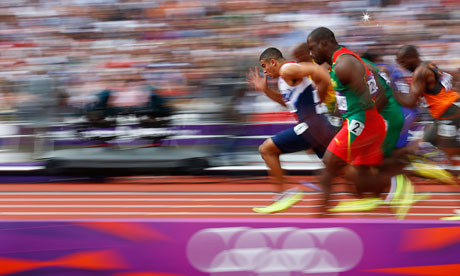 Britain's Adam Gemili leads 100m heats at the London 2012 Olympic Games at the Olympic Stadium