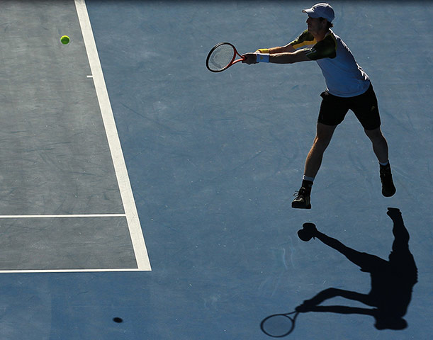 Andy Murray powers a backhand from the baseline  