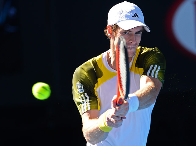 Andy Murray hits a return 