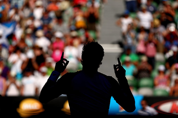Andy Murray celebrates winning his quarter-final match against Jérémy Chardy