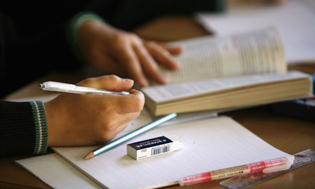 Pupils writing in a lesson