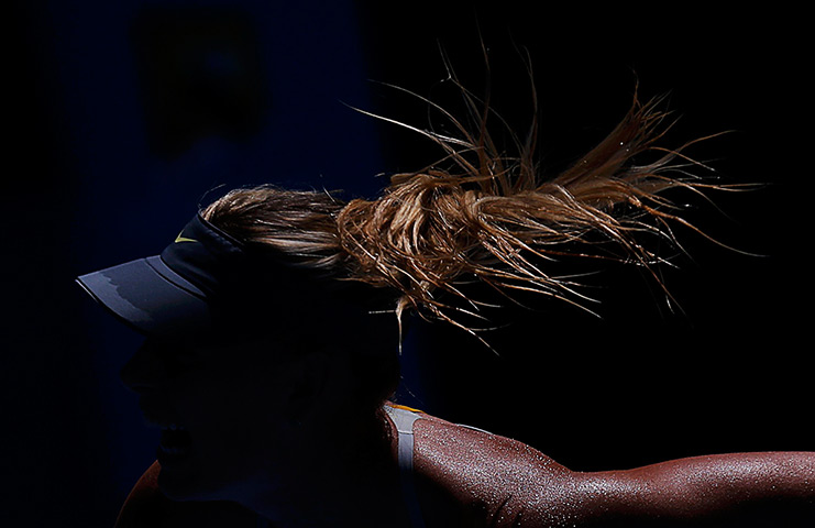 24 hours: Melbourne, Australia: Maria Sharapova of Russia serves