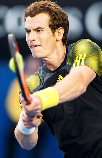 Murray v Federer: Andy Murray of Britain hits a return to Roger Federer