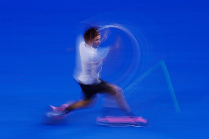 Murray v Federer: Roger Federer hits a return 