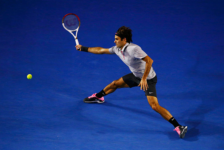 Murray v Federer: Roger Federer hits a return