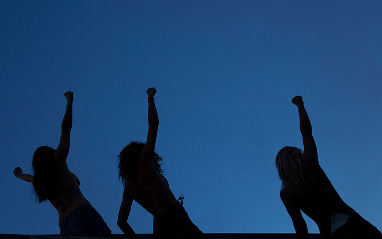 Femen: FEMEN members demonstrate at the congress centrum