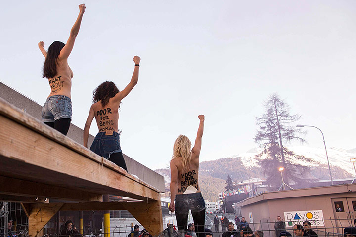 Femen: Activist from Femen protests outside WEF in Davos