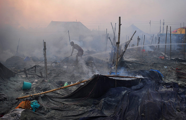 24 Hours: The remnants of a tent erected to house Hindu holy men in Allahabad