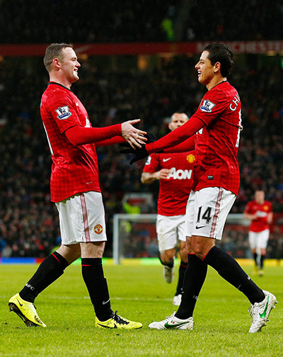 fa cup round-up: Hernandez and Rooney celebrate