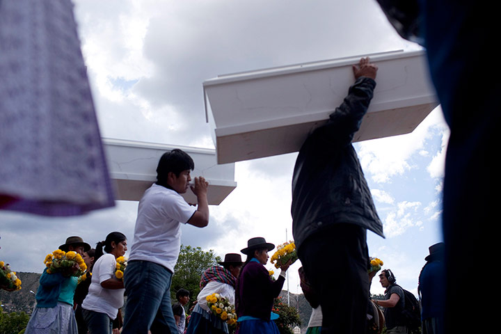 24hours: Ayacucho, Peru: People carry the coffins of relatives killed in massacres