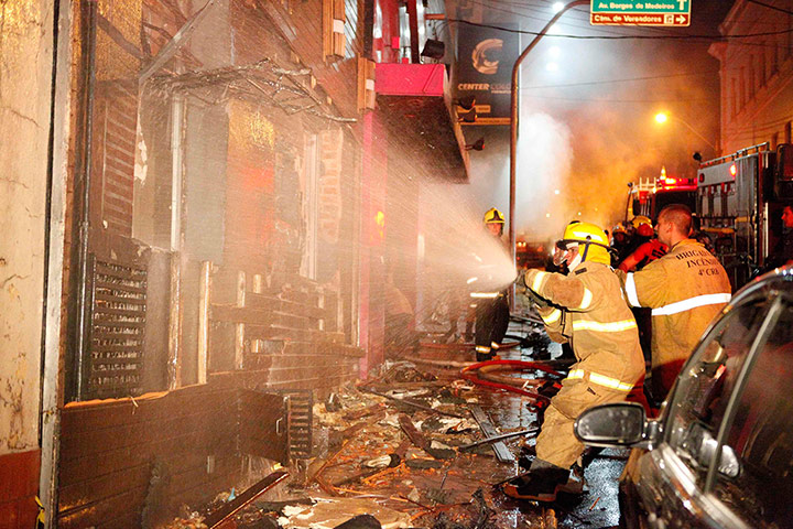 Rio nightclub: Fire-fighters attempt to extinguish the fire at Kiss nightclub