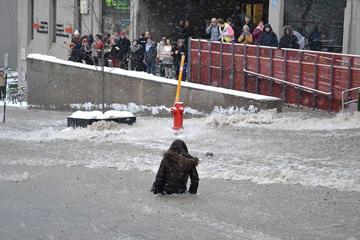 24 hours: A woman is swept away by flood water in Montreal, Canada 
