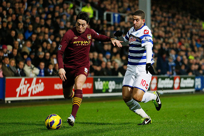 Tuesday's matches: Manchester City's Samir Nasri nips past QPR's Adel Taarabt 
