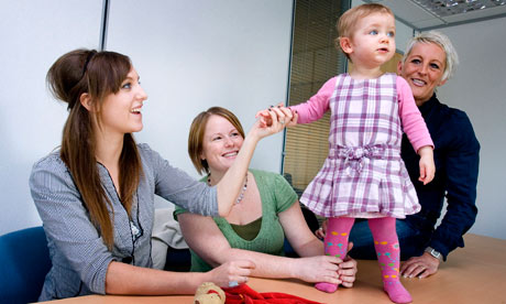 Social workers with baby