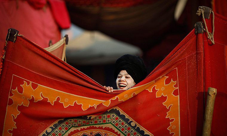 24 hours in pictures: A newly initiated Hindu monk of the Shri Panchayati 