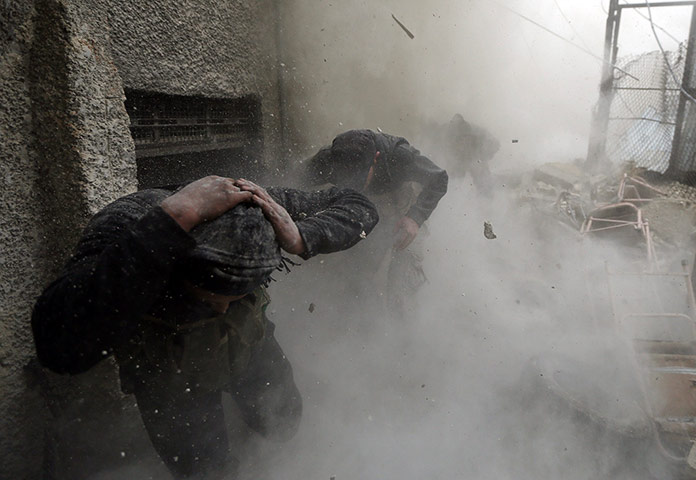 24 Hours: Damascus, Syria: Free Syrian Army fighters run for cover