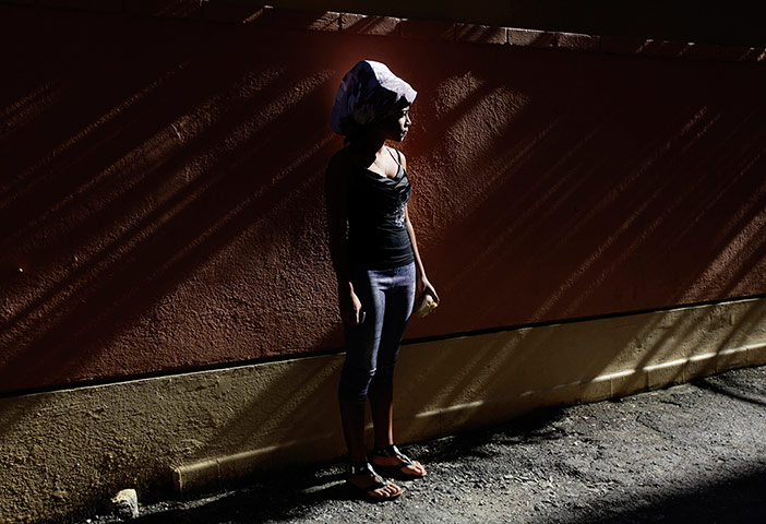 24 Hours: Havana, Cuba: Carmen Gonzalez with her hair in curlers