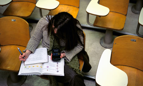 Woman studying in lecture hall