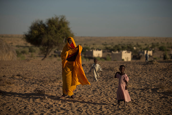 Chad Stunted Nation:  Achta, right, walks with her mother Fatme Ousmane