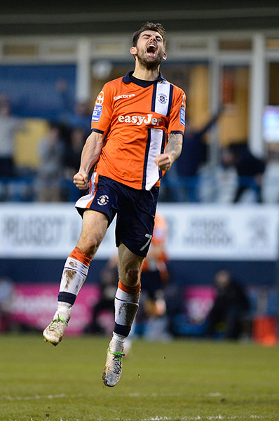 Alex Lawless celebrates