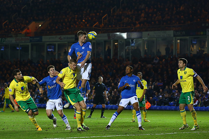 Shaun Brisley heads the ball