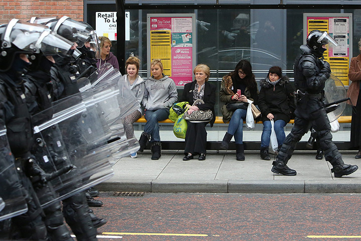 24 hours: Belfast, Northern ireland: Local shoppers waiting at a bus stop