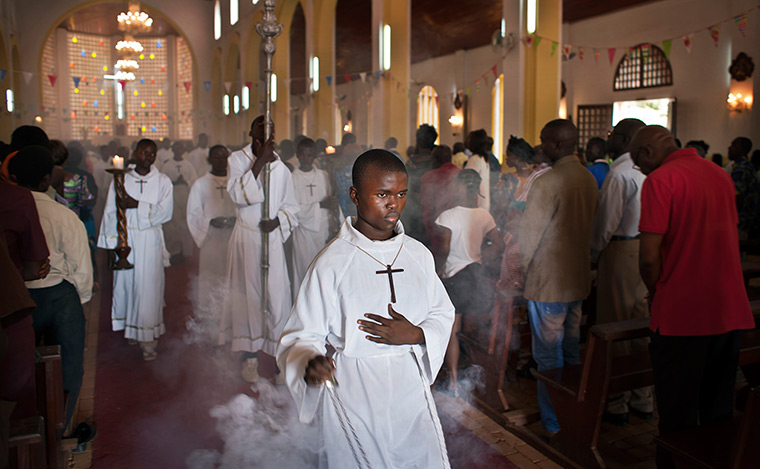 24 hours: Bangui, Central African Republic: A thurifer swings  incense
