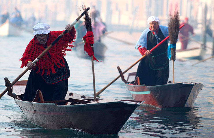 Epiphany Day: Men in traditional Befana costumes in Venice