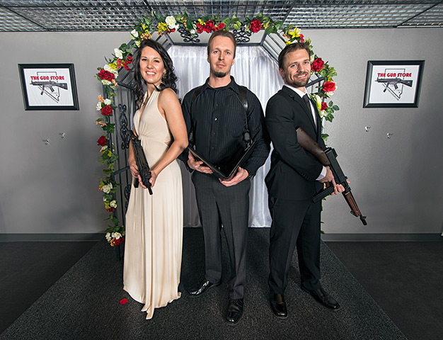 Shotgun weddings: A member of the Gun Store's staff