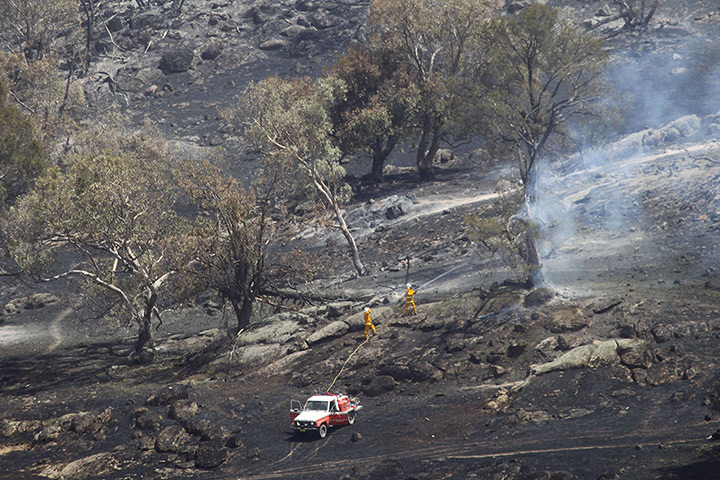 Australia heatwave: Firefighters battle a grassfire in Oura, near Wagga Wagga New South Wales
