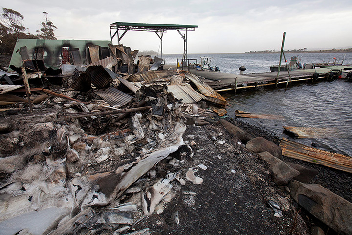 Australia heatwave: A melted fibreglass boat at the jetty