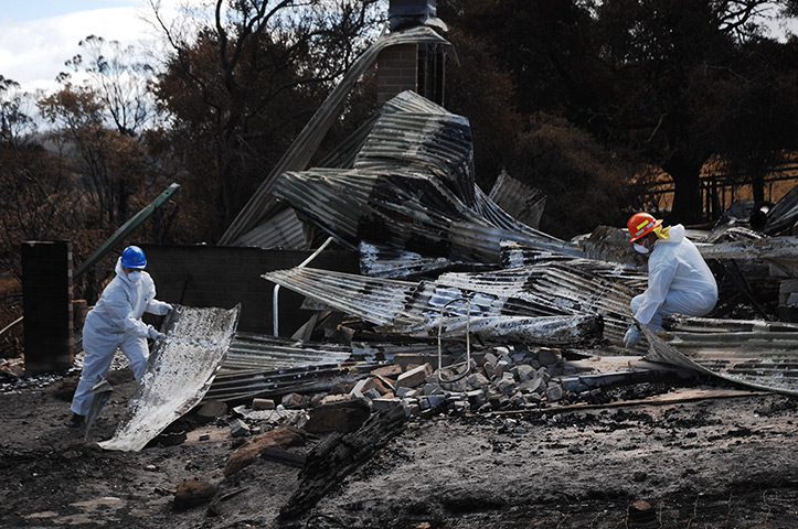Wildfires Australia: Rescue services search among bushfire-affected properties at Copping
