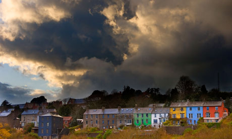 clouds over houses