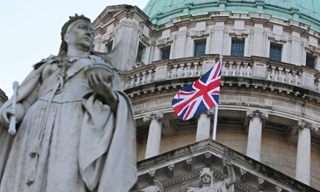 The Union flag flies behind a statue of Queen Victoria at Belfast City Hall, Northern Ireland. The flag was hoisted over Belfast's City Hall today for the first time since its removal a month ago sparked riots in Northern Ireland.