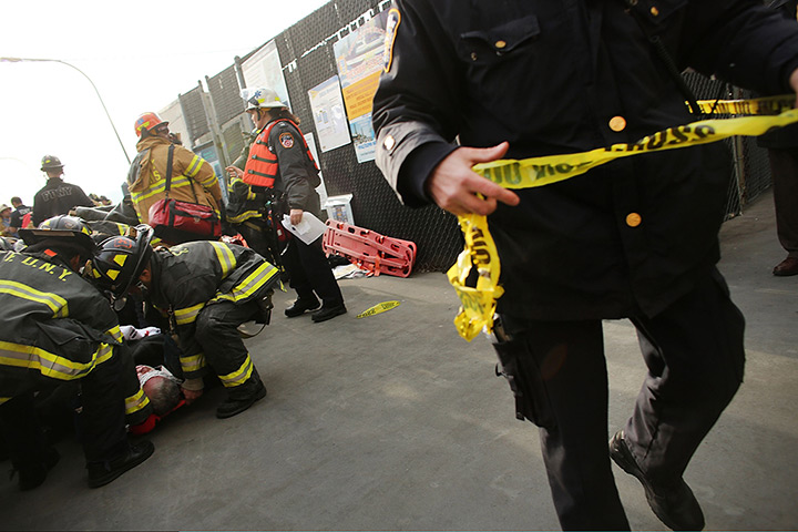 Seastreak ferry: Police cordon off the scene as an injured person is carried