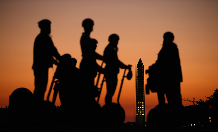 US shutdown: Tourists on Segways are briefed during a stop near the US Capitol