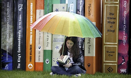 Woman reading at Hay-on-Wye Book Festival