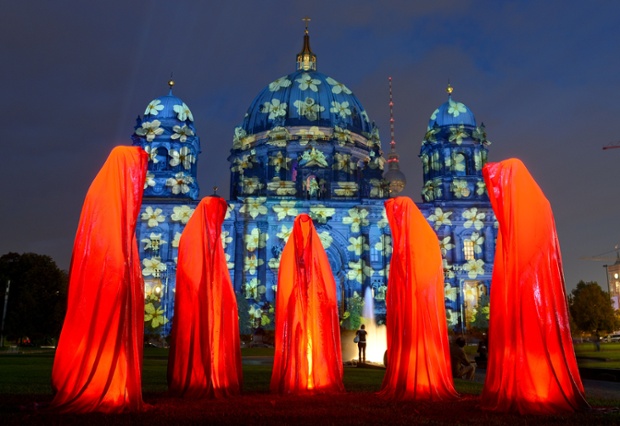 An installation entitled Keeper of Time in front of Berlin Cathedral on the first day of the Festival of Lights. Dozens of the city's buildings are illuminated with colourful projections during the annual event.