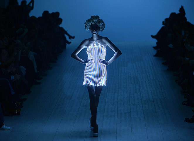 20 Photos: A model wears a dress by Zalevskiy during Ukrainian fashion week in Kiev