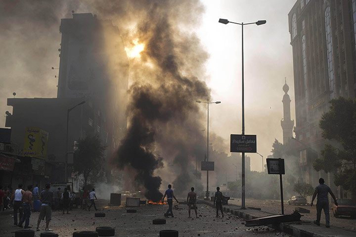 20 Photos: Supporters and opponents of Mohamed Morsi clash in Cairo, Egypt
