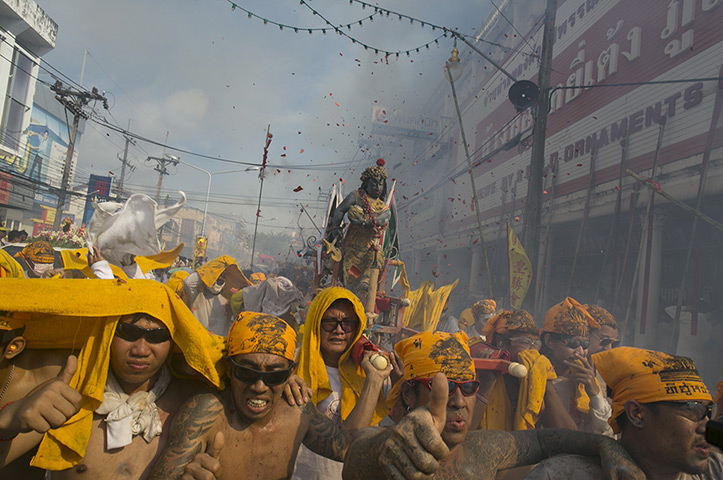 Weekend in pictures: Phuket, Thailand: Vegetarian festival devotees parade through the streets. 