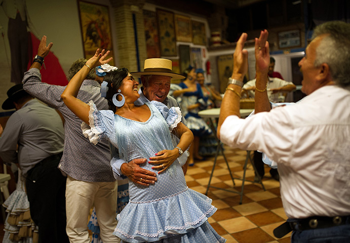 Weekend in pictures: Fuengirola, Spain: A couple dance to traditional Spanish music during the week-long Lady Of The Rosary festival 