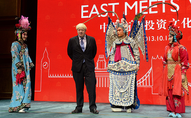 Boris in China: Mayor of London Boris Johnson meets members of the Peking Opera at the Rein