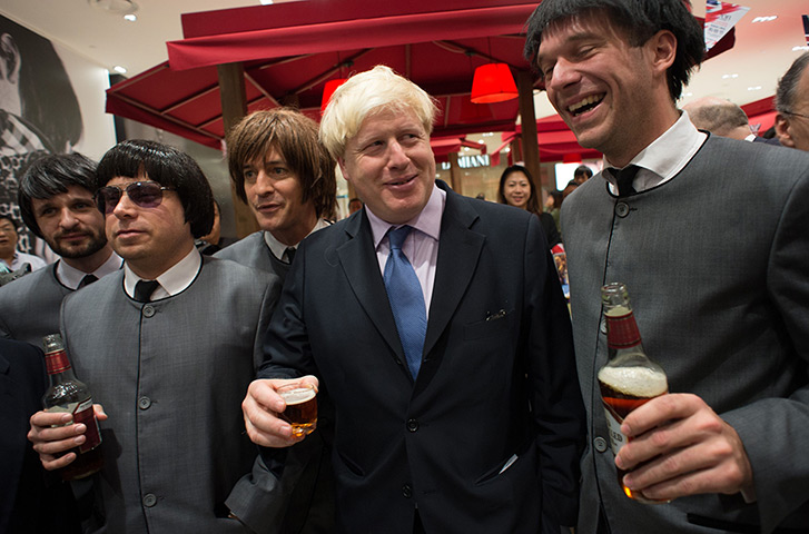 Boris in China: Mayor of London Boris Johnson meets members of Beatles tribute band The Bei